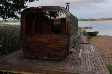 Фотографии Дома для отпуска Sodyba Pas Vasiliauskus - neribotos kubilo ir pirties pramogos г. Rimėnai (Литва) №4 Фото Дома для отпуска Sodyba Pas Vasiliauskus - neribotos kubilo ir pirties pramogos г. Rimėnai 4